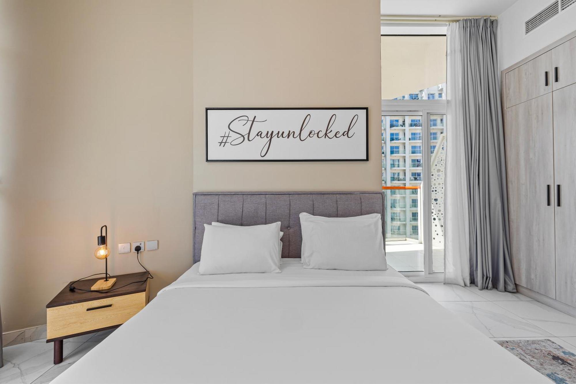 Unlock Waters Edge Appartement Dubaï